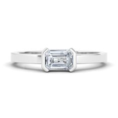 Our favorite way to rock our values is with an emerald cut diamond and a setting as unique as a half-bezel! Modern Octagon Emerald Ring With Diamond, Timeless Bezel-set Emerald Cut Emerald Ring, Platinum Emerald Cut Ring With Bezel Setting, Timeless Diamond Emerald Ring With Bezel Setting, Modern White Gold Emerald Ring With Bezel Setting, White Emerald-cut Rings With Bezel Setting, Timeless Octagon Diamond Ring With Bezel Setting, Emerald Ring With Bezel-set Asscher Cut Diamond, Emerald Ring With Asscher Cut Diamond And Bezel Setting