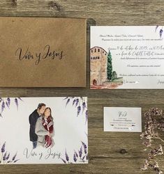 wedding stationery and save the date cards on a wooden table with lavenders in bloom