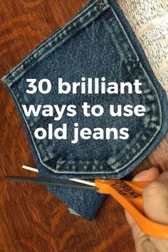 someone is using scissors to cut the back of an old jean's pocket with text that reads, 30 brilliant ways to use old jeans