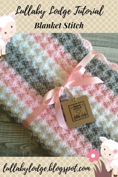 a crocheted blanket with pink and gray stripes on it, next to a tag that says baby police patrol blanket stitch