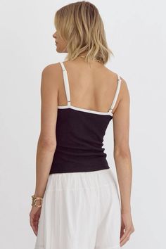 Spice up your summer wardrobe with our Ribbon Ribbed Tank! This solid, spaghetti strap tank is not your average basic. Featuring a playful bow detail at the bust, it adds a touch of fun and flare to any outfit. Perfect for layering or wearing on its own, this tank is a must-have for any fashion lover. Coat Dress