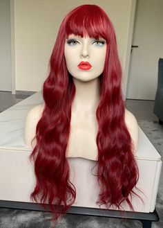 Dark Red Synthetic Wig Long Loose Wave Wig Hair with Bangs,Cosplay Wig,Burgundy Wig,Gift for her 1. for cosplay and special event use 2. Soft High Quality Heat Resistant Fiber: Can be styled up to 200oC or 390oF, but recommended at 150oC or 300oF 3. Breathable Wig Cap Structure: Average cap size circumference 22.5 Inches with 2 adjustable straps,which help fit your head better. Warm Tips: 1).Please make sure the shipping address you leave is correct. 2)You can wear it as is straight from the bag, or brush & fluff up the waves for a softer but bigger look! 3) Colors might look different in person due to different monitor brands and/or settings. MAINTENANCE:( is an important part of making sure you can enjoy wigs to the fullest. Wigs need to be properly cared for to avoid unnecessary sheddin Loose Wave Wig, Burgundy Wig, Hair With Bangs, Wave Wig, Mild Shampoo, Synthetic Wig, Cosplay Wig, Loose Waves, Heat Styling Products