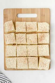 tofu cut into squares on a cutting board