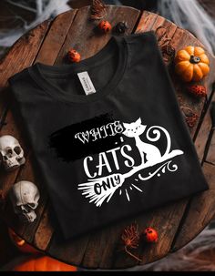 White  Cats Only Shirt, Fall Spooky vibe shirt , Happy Halloween Sweatshirt , Cute Autumn Tee, Funny Halloween Tee, Funny Witch Cats  Shirt 🛍️ **HOW TO ORDER**   📄 Pick your size and color from the drop-down menus   📸 Review the sizing and color options in the listing photos   🛒 Add the item to your cart and complete the checkout process   🚀 We'll start working on your order right away!   ✏️ **SIZING**   📊 Please review the listing photos to see the size charts   🖼️ These photos will also White T-shirt With Cat Print For Fall, Black Halloween T-shirt With Cat Design, Halloween White T-shirt With Cat Print, Short Sleeve T-shirt With Cat Print For Halloween, Witch Cat, Fall Tee, White Cats, Halloween Novelty Cotton T-shirt, Halloween Tees