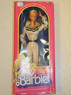 the barbie doll is in its original box