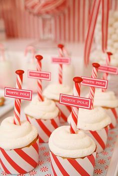 cupcakes with red and white striped paper wrappers