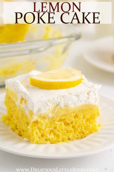 a lemon poke cake on a plate with a bite taken out of it