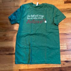 Christmas Tee With Saying “ The Bell Still Rings For All Who Truly Believe” Size Medium. Never Worn Christmas Tees, Bella Canvas, Tops & Tees, Womens Tops, Size Medium, Canvas, Christmas, Green, Women Shopping