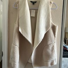 Really Neat Vest, Super Soft Faux Fur With Pockets In A Beautiful Cream Color. Size L, Never Worn. Ralph Lauren Beige Outerwear For Spring, Ralph Lauren Beige Outerwear For Work, Ralph Lauren Beige Spring Outerwear, Ralph Lauren Beige Winter Outerwear, Ralph Lauren Beige Outerwear For Fall, Ralph Lauren White Winter Outerwear, Chic Ralph Lauren Fall Outerwear, Ralph Lauren Outerwear For Cold Weather In Fall, Womens Utility Vest