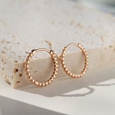 PAIR GOLD BALL HOOP EARRINGS ✰ 14K Solid Gold ✰ Approx 1.35 Gram ✰ Thickness : 1.5 mm. ✰ Width: 1.5 mm. ✰ Diameter: 12 mm. ✰ 14K Solid Gold ✰ Rose Gold | White Gold | Yellow Gold ✰ You can choose gold color of earrings. ✰ Orders typically ship within 5-6 business days, excluding weekends + holidays. ✰ All orders are sent in the elegant gift box. ✰ Shipping Methods: Fedex / UPS / TNT ✰ Delivery to USA 3-4 days ✰ Free Shipping Rose Gold Tarnish Resistant Round Earrings, Luxury Rose Gold Drop Earrings, Fine Jewelry Rose Gold Small Hoop Earrings, Rose Gold Sterling Silver Hoop Earrings Fine Jewelry, Rose Gold Sterling Silver Hoop Earrings, Rose Gold Round Huggie Earrings For Wedding, Rose Gold Round Huggie Earrings, Single Round Rose Gold Earring, Luxury Rose Gold Huggie Earrings Gift