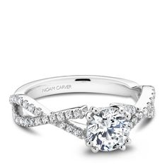 a diamond engagement ring with a twisted band