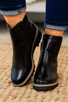 Elevate your style with our Sleek Street Booties in black! These round toe chelsea booties feature a stylish block heel, perfect for all-day wear! Add a touch of sophistication to any outfit with these versatile and comfortable booties! Heel Height: 2.25" Wedge Heel Sneakers, Winter Chic, Sweatshirt Short Sleeve, Maxi Dress Party, Sunglasses Shop, Sneaker Heels, Shop Maxi Dresses, Black Booties, Holiday Fashion