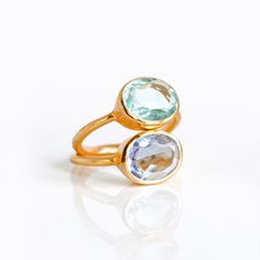 "You'll love this pairing of TWO oval gemstones rings: Alexandrite and Sky Blue Quartz. The pale lavender and light aqua blue of these pair of gemstones are a great combination. These happen to be the birthstones for June and December as well! Available in bright sterling silver or 18k vermeil gold. Gemstone are approximately 8mm x 13mm in size. Open back setting. Band stamped with 925 on inside. METAL ✦ 18K VERMEIL GOLD ✦ 18K ROSE VERMEIL GOLD ✦ BRIGHT STERLING SILVER Ring will be shipped in Da Stackable Ring Sets, Blue Gemstone Rings, Pale Lavender, Purple Amethyst Ring, Gold Vermeil Jewelry, Bezel Set Ring, Stacking Ring Set, Trendy Ring, Bezel Ring