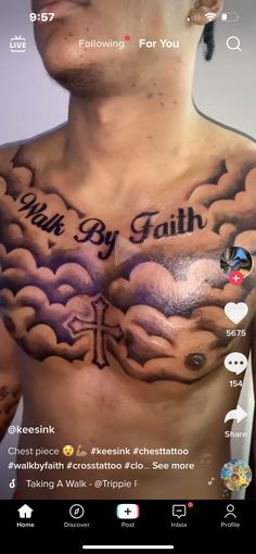 a man with his chest covered in tattoos and the words walk by faith on it