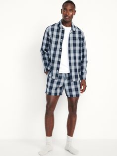 set includes pajama shirt and matching shorts spread collar long sleeves button front patch chest pocket elastic-waist pajama shorts on-seam pockets loose fit shorts hit above knee model is approx.  6'1" and wears size mmachine wash according to the care instruction label Casual Sleepwear With Pockets, Blue Button-up Cotton Shorts, Blue Cotton Button-up Shorts, Casual Cotton Button-up Sleepwear, Cotton Short Sleepwear With Pockets, Cotton Sleepwear With Pockets, Short Design, Cotton Sleepwear With Pockets, Cotton Sleepwear With Pockets, Short Style, Cotton Sleepwear With Pockets For Vacation