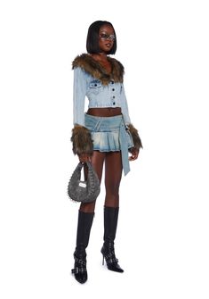 This jacket has a denim construction with a faux fur notched lapel collar, faux fur cuffs, chest pockets with button closures, and front button closures. Long Sleeve Denim Jacket With Faux Fur Lining, Denim Jacket With Faux Fur Lining And Long Sleeves, Denim Jacket With Faux Fur Lining, Denim Outerwear With Faux Fur Trim, Trendy Denim Outerwear With Faux Fur Trim, Fall Denim Jacket With Faux Fur Lining, Winter Denim Jacket With Faux Fur Trim, Fall Denim Jacket With Faux Fur Trim, Fall Denim Outerwear With Faux Fur Trim