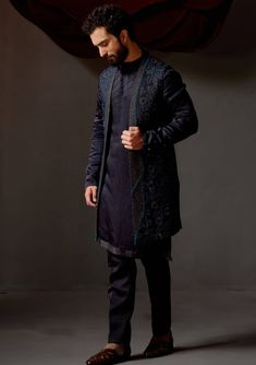 Jatin Malik-Midnight Blue Shrug And Kurta Set-INDIASPOPUP.COM Fitted Sets With Embroidered Sleeves For Transitional Season, Fitted Kurta With Embroidered Sleeves And Traditional Drape, Fitted Designer Wear Sets For Winter, Fitted Sets With Embroidered Sleeves For Eid, Fitted Festive Outerwear With Embroidered Sleeves, Festive Fitted Kurta With Set-in Sleeves, Fitted Sets For Eid Ceremony, Fitted Sets With Embroidered Sleeves For Festive Season, Embroidered Fitted Front Open Sets