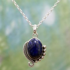 Shanker comes from a family of Indian farmers, choosing instead to forge his own success by working with local artisans to help them create beautiful pieces of jewelry. He presents this pendant necklace, which features a single, oval-shaped cabochon of lapis lazuli. The stone is surrounded by handcrafted rope and dot motifs in sterling silver for a truly delightful necklace. Wire Jewelry Patterns, Soldered Jewelry, Lapis Lazuli Jewelry, Lapis Lazuli Pendant, Carnelian Pendant, Lapis Lazuli Necklace, Hot Jewelry, Nameplate Necklace, Blue Lapis