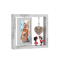 a wooden frame with a heart hanging from it and a keychain attached to it