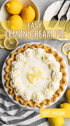 a lemon cream pie on a plate next to some lemons