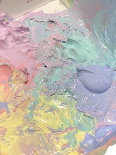 the paint is being mixed together with other colors