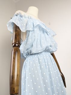 Lovely off the shoulder spotty dress - baby blue with white spots. Featuring frilly off or on the shoulder neckline and elastic waistband. Lovely gathered deep hem. Fully lined in blue silk. Condition: Very Good  Measurements: Bust - 34 inches  Waist - flexible 24-30 inches  Length -  60 inches  Best fit around a UK 8 but please check the above measurements. Spring Off-shoulder Polka Dot Dress, Blue Swiss Dot Summer Dress, Spotty Dress, Off The Shoulder Maxi Dress, Dress Clothes For Women, Baby Dress, Off The Shoulder, 1970s, Dress Outfits