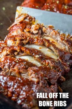 ribs covered in bbq sauce and garnished with parmesan cheese