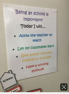 a bulletin board with writing on it and magnets attached to the back of it