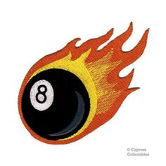 a billiard ball with flames on it