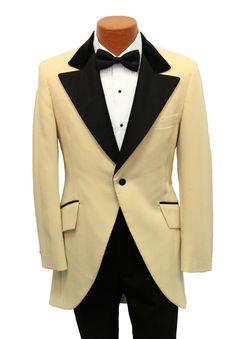 Tan Vintage Tuxedo Jacket This is a true vintage tuxedo jacket that was made for the rental industry in the 1970s.  Perfect piece for a Halloween costume or for someone who wants to stand out at a formal event.  It features a one button single breasted front and wide satin lapels.  Black velvet collar.  The coat cuts away in the front to the tails in back.  Please zoom in on the photos above to fully appreciate this unique coat. Listing is for the coat only.  If you are in need of additional for Tailored Retro Semi-formal Outerwear, Tailored Retro Outerwear For Semi-formal Occasions, Retro Semi-formal Winter Outerwear, Retro Tailored Sport Coat For Formal Occasions, Tailored Retro Sport Coat For Formal Occasions, Retro Fitted Formal Outerwear, Tailored Vintage Blazer, Retro Semi-formal Single-breasted Outerwear, Retro Long Sleeve Semi-formal Outerwear