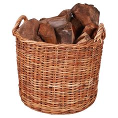 a wicker basket filled with logs on a white background