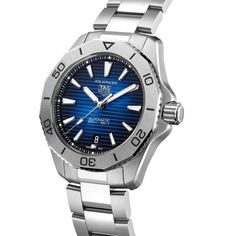 With a sunray brushed smoky blue dial and 3-row bracelet, this Aquaracer Professional 200 was designed to capture the go-anywhere spirit of exploration. Tag Heuer Monaco, Tag Heuer Aquaracer, Tag Heuer Watch, Gents Watches, Breitling Navitimer, Sports Watch, Omega Speedmaster, Rolex Submariner, Dive Watches