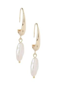 Lightweight and elegant, our Haven Earring has a freshwater pearl dangling from a small hoop. We love pearls for any occasion, and this pair is effortless and easy to wear. Material: Freshwater Pearl, Brass Size: 1.75" x 0.5" French Clip Imported Pearl Teardrop Hoop Earrings With Pearl Drop, Minimalist Metal Pearl Drop Earrings, Pearl White Dangle Hoop Earrings With Pearl Charm, Metal Drop Earrings With Pearl Charm, Teardrop Pearl Hoop Earrings With Pearl Charm, Pearl Drop Dangle Hoop Earrings, Small Hoop Pearl Drop Earrings In Metal, Small Hoop Metal Pearl Drop Earrings, Pearl White Dangle Hoop Earrings With Pearl Drop