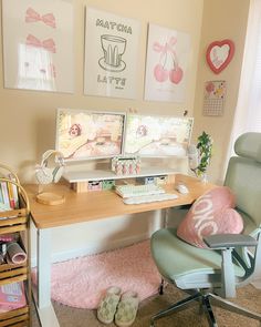 a desk with two computer screens on top of it next to a chair and bookshelf