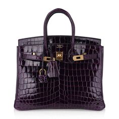 For Sale on 1stDibs - Mightychic offers an Hermes Birkin 25 bag featured in rich, saturated Aubergine crocodile. Rarely produced this exquisite jewel toned beauty is a must Luxury Purple Rectangular Bag, Luxury Purple Formal Bag, Luxury Purple Formal Bags, Luxury Purple Evening Bags, Luxury Purple Formal Shoulder Bag, Luxury Purple Shoulder Bag, Luxury Purple Shoulder Bag For Formal Occasions, Luxury Purple Top Handle Bag, Luxury Purple Shoulder Bag With Gold-tone Hardware