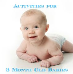 a smiling baby laying on the floor wearing a diaper and looking at the camera