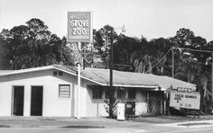 an old black and white photo of a building with a sign for the grieve zoo