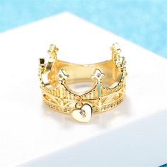 Rock a regal look wherever you go with this gold-plated ring in the shape of a crown, sparkling with cubic zirconia accents. 0.48'' W 18k gold-plated copper / cubic zirconia Crown Ring, Ring Sale, Gold Crown, Rock A, Fancy Jewelry, Velvet Bag, Small Heart, The Shape, Promise Rings