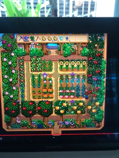 a computer screen with a garden on it