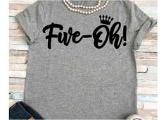 a t - shirt with the word fire on it and a crown in black ink