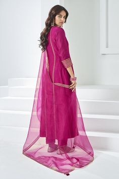 Rose pink anarkali featuring a round neckline and three quarter sleeves. Paired with a matching pant and dupatta, embellished with sequins and aari work., Fit: Relaxed Pink Chanderi Unstitched Suit With Cutdana, Pink Anarkali Set With Zari Work, Pink Straight Kurta Churidar For Wedding, Pink Floor-length Traditional Wear With Dupatta, Pink Wedding Churidar With Straight Kurta, Wedding Pink Churidar With Straight Kurta, Pink Anarkali Salwar Kameez With Dupatta, Pink Anarkali Set With Traditional Drape, Pink Anarkali Churidar With Dupatta