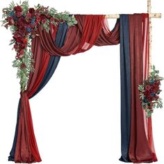 a red and blue wedding arch decorated with flowers