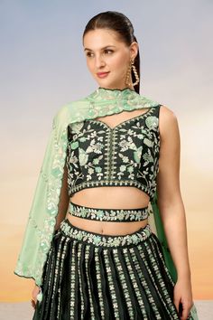 Dazzle at any event with our glamorous Wedding Wear Lehenga Choli. Each pack contains a semi-stitched Lehenga, an unstitched Choli, and a complementary Dupatta, all with ornate Sequins Work. The Lehenga has a drawstring closure for adjustability and comfort, and the three-quarter sleeve Blouse ensures a sophisticated look. Do consider that the item's actual color may slightly differ from the website image due to fabric dyes and lighting conditions. Lehenga Green, Bride Looks, Satin Lehenga, Lehenga Crop Top, Three Quarter Sleeve Blouses, Lehenga Choli Wedding, Traditional Silk Saree, Stitched Lehenga, Bollywood Lehenga