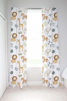 the curtains in this room have animals on them