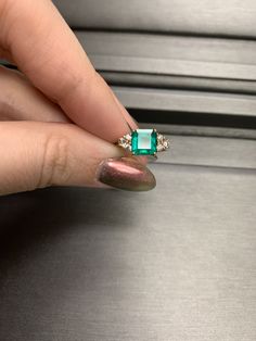 Metal: 14 karat yellow gold Main Stone: Natural Fine Emerald 1.80 carat Square Emerald Faceted Origin, Columbia Side Stones: 6 Natural Diamonds .25 carat GH/VS Size: 5.5, Can be Resized by most jewelers with a LASER Welder only. (contact your local jeweler) Vintage: 90s Great Mother's Day gift idea for the mom who loves jewelry and has it all Columbia Emerald Ring, Ring Square Stone, Columbian Emerald Ring, Luxury Asscher-cut Jewelry With Accent Stones, 14k Gold Emerald Ring With Vs Clarity, Luxury Asscher Cut Jewelry With Accent Stones, Emerald Ring With Vvs Clarity Round Cut, 14k Gold Emerald Ring With Princess And Brilliant Cut, Round Cut Jewelry With Accent Stones For Proposal