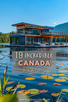 A stunning floating Airbnb in Canada set on a tranquil lake, surrounded by lush forests and distant mountains, offering a modern architectural design with large glass windows and spacious decks for relaxing.