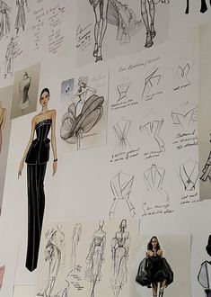 a wall covered in drawings and sketches of women's dresses