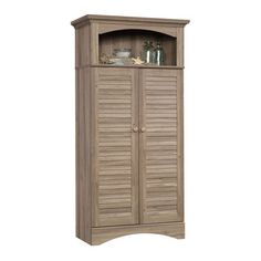 a wooden cabinet with shutter doors and shelves