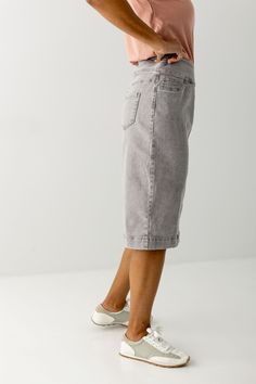 This soft denim skirt has a vintage wash for that lived in look we love. It is made from a quality, stretch denim to ensure a modest and flattering fit. Featuring a wide waistband for extra comfort and easy styling. This skirt was designed with everyday wear in mind and will pair well with just about any casual top in your wardrobe. 75% Cotton 23% Polyester 2% Spandex Wash Cold Gentle Cycle Hang to Dry Low Iron if Needed Model A Height 5'9" | Wearing Size 4 in 26" Length Model B Height 5'6" | We Medium Wash Stretch Knee-length Bottoms, Denim Blue Stretch Knee-length Bottoms, Stretch Denim Blue Knee-length Bottoms, Knee-length Medium Wash Denim Bottoms, Spring Stretch Washed Bottoms, Mid-rise Washed Denim Skirt For Spring, Relaxed Fit Short Denim Skirt For Spring, Light Wash Knee-length Bottoms For Spring, Knee-length Light Wash Bottoms For Spring