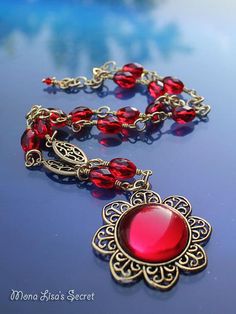 image 0 Gold Necklace Red, Red Crystal Necklace, Seashell Wall Art, Red Necklace, Necklace Red, Blue Evil Eye, Flower Pendant Necklace, Gold Filigree, Red Crystals